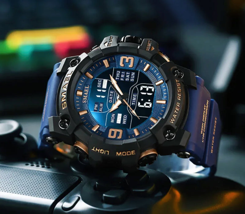 Blue and black wristwatch with digital display on a blurred background