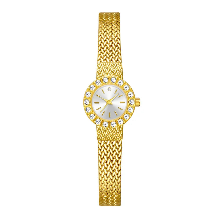 womens gold bracelet wrist watch with round white clock face with diamonds