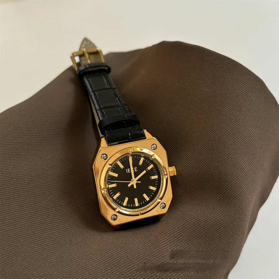 women's wrist watch with dark brown leather strap with black watch face